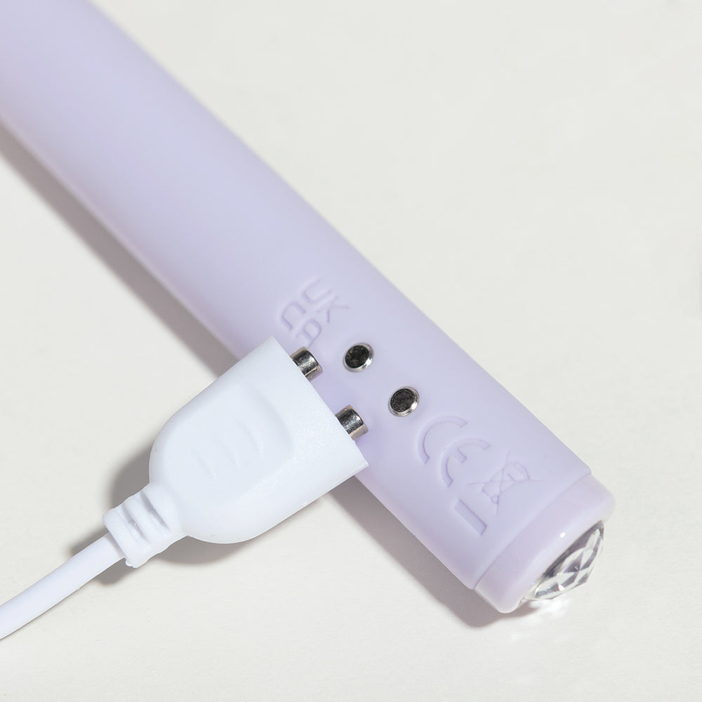 Ticky plume de massage vibrante rechargeable
